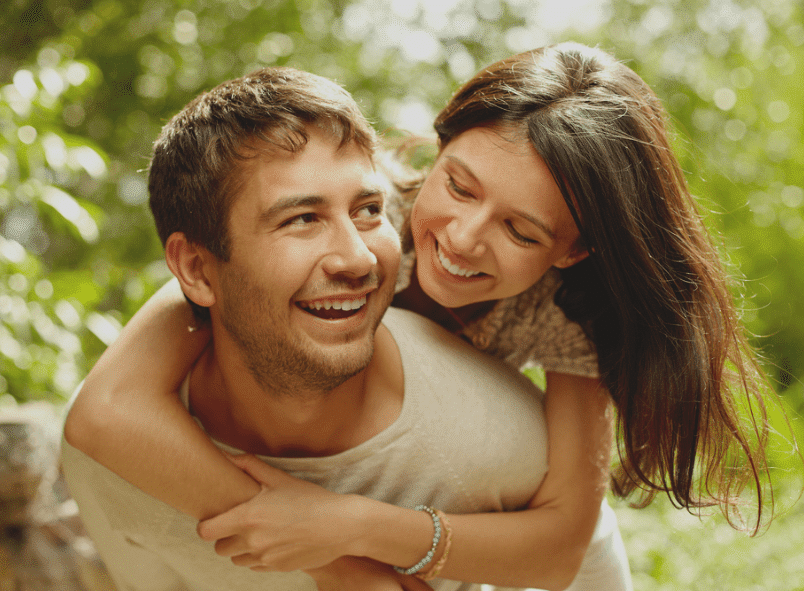 happy couple exploring outside together