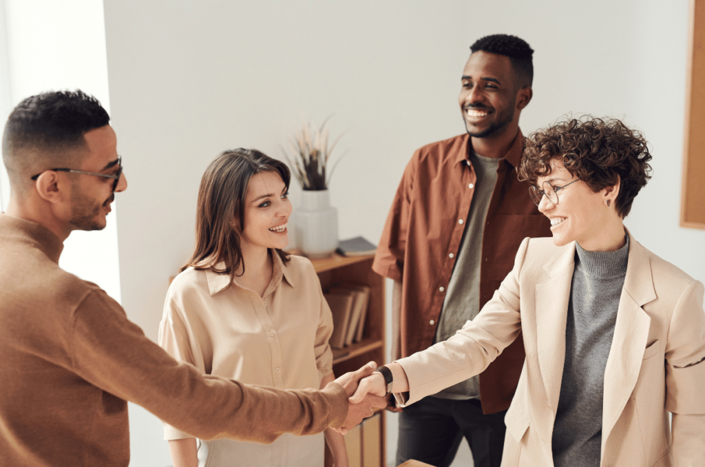 two women and two men meeting each other