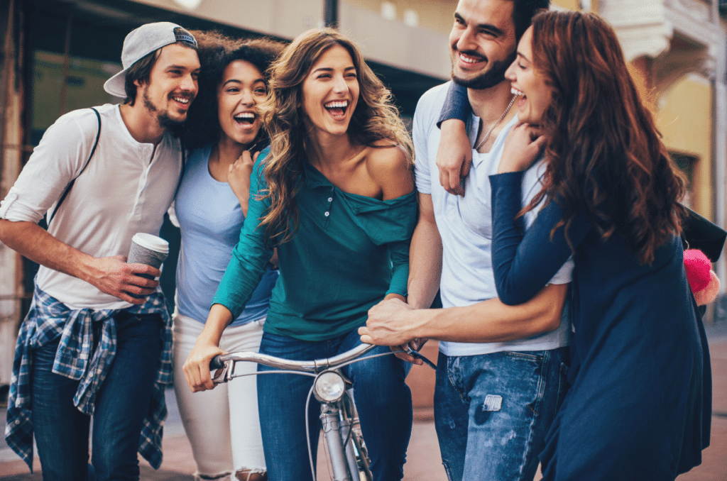 group of friends riding bikes together