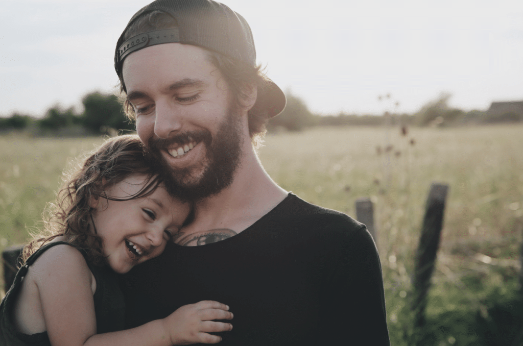 little girl hugging her dad