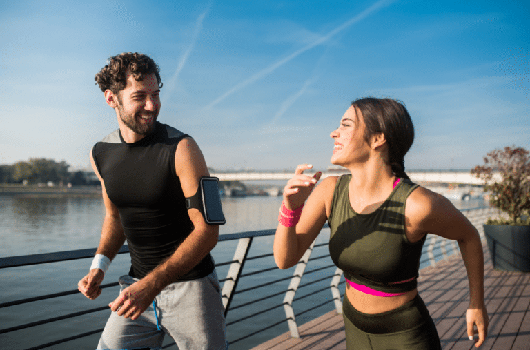 man and woman happily running together