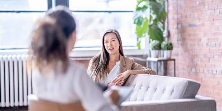 woman talking in therapy session