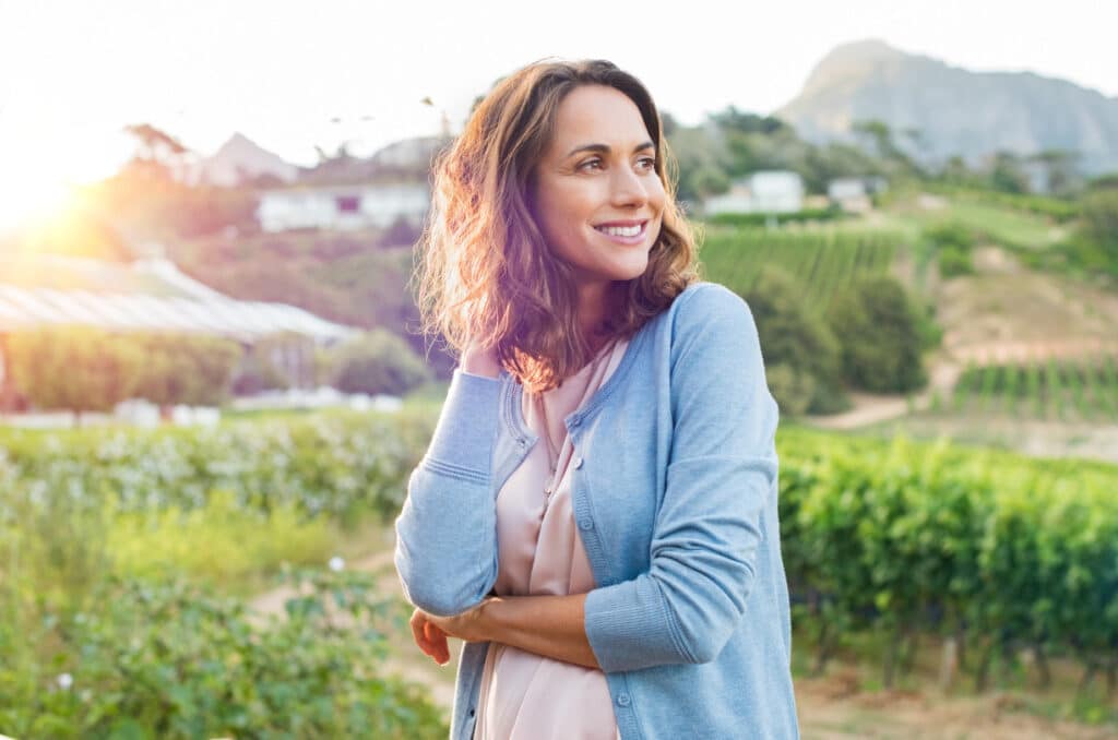 woman smiling outside