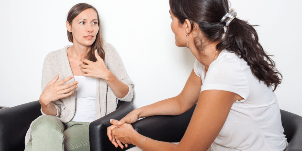 woman talking to therapist