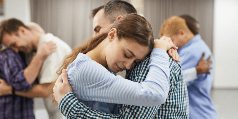 a man and woman hugging