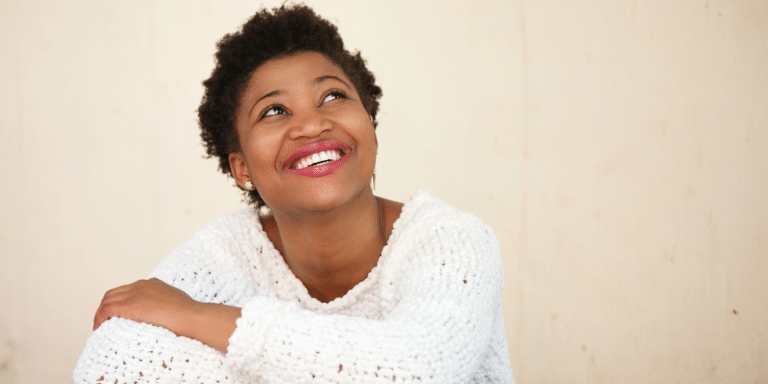 motivated and encouraged woman looking upwards
