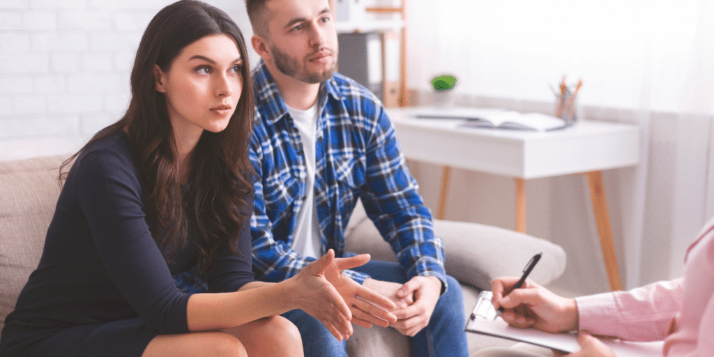 Couple in therapy session at a counselors office in Denver, Colorado