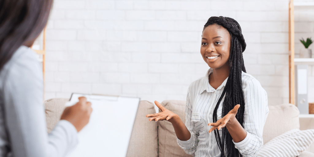 Woman experiencing a positive mental health breakthrough in therapy in Denver