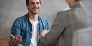 Man feeling grateful and hopeful after therapy session in Denver, Colorado