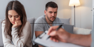 Couple in marriage counseling session to resolve conflict in Denver, Colorado