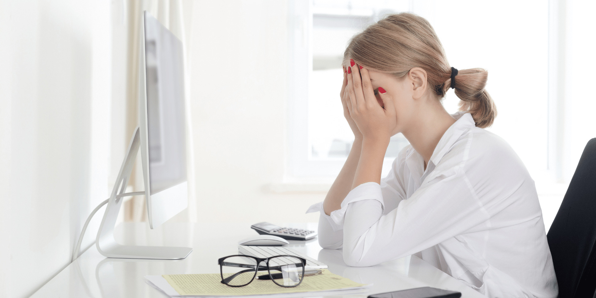 Stressed woman experiencing anxiety and burnout seeking therapy in Denver